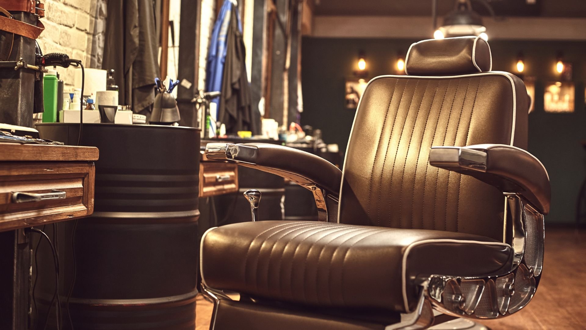 Vintage leather barber chair in a classic barbershop with warm lighting